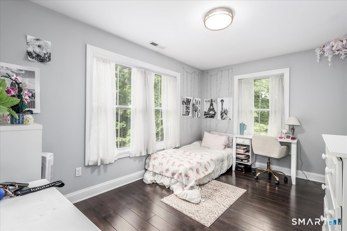 127 Putnam Park Road Bethel, CT 06801 - Photo 19 of 35 a bedroom with a bed and a window
