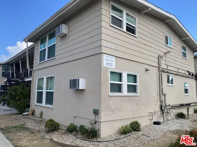 a view of a hallway with staircase