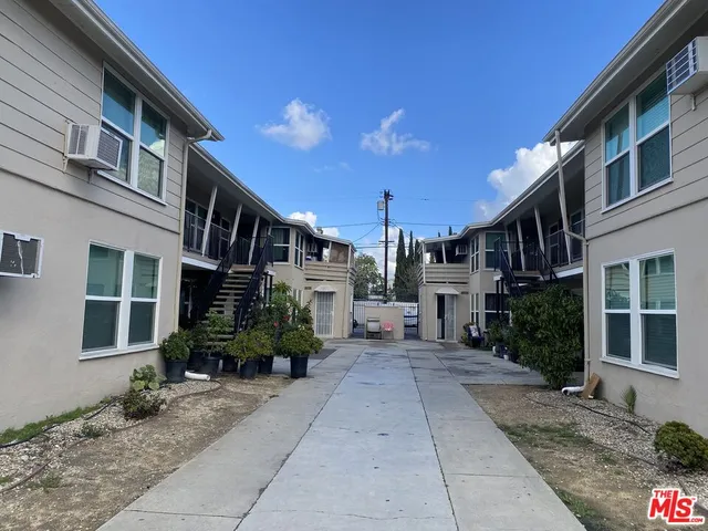 a view of a building with a street