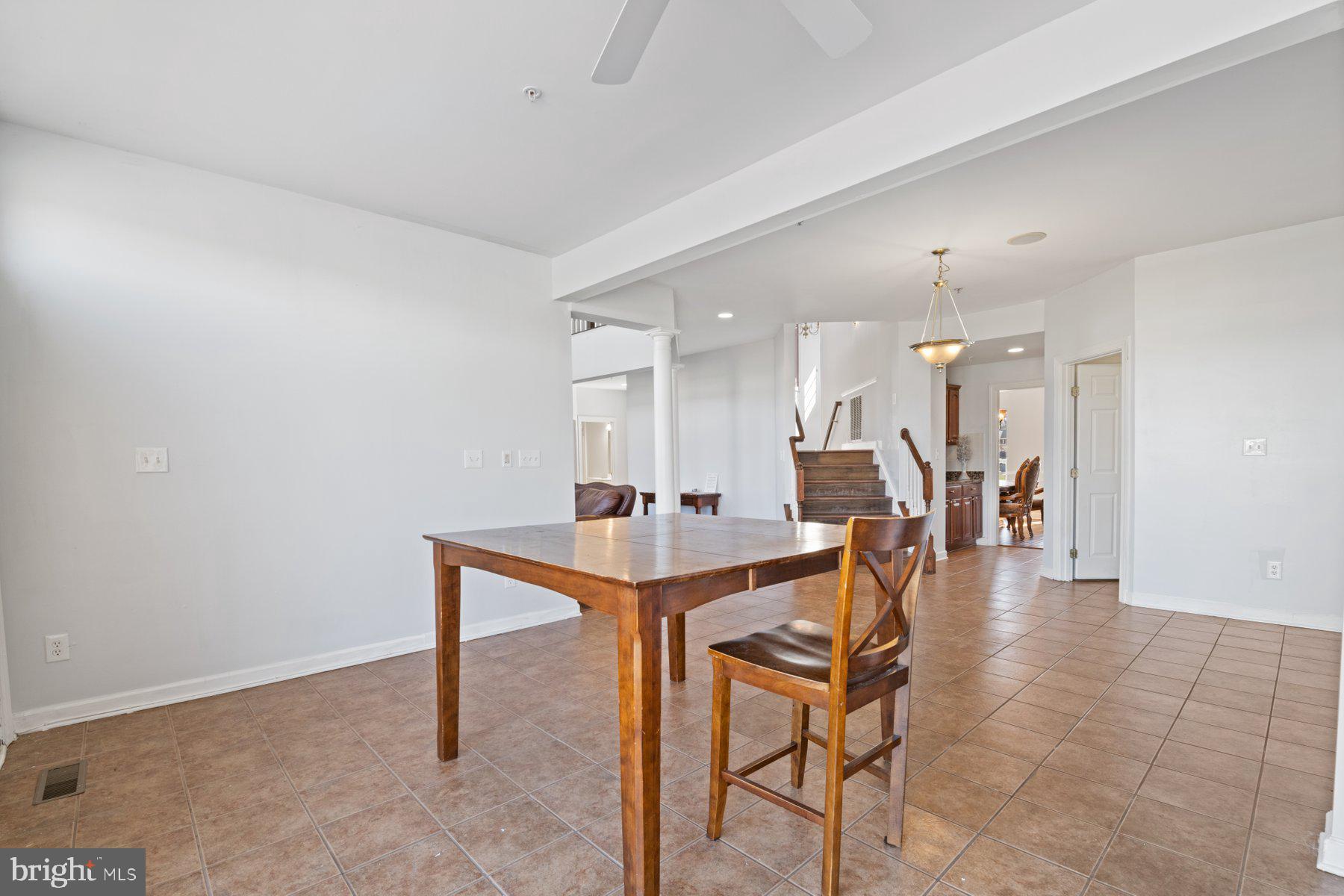 14206 Derby Ridge Road Bowie, MD 20721 - Photo 26 of 77 a view of a dining room with furniture