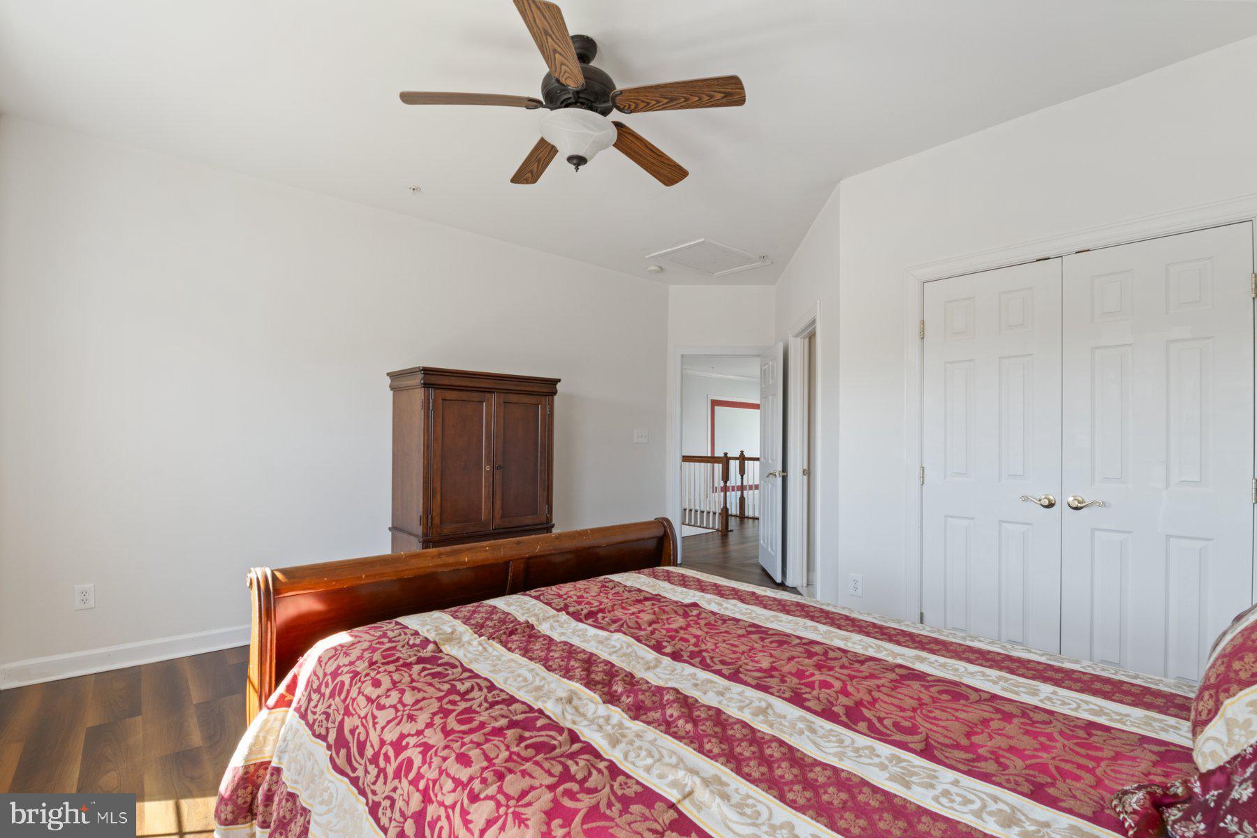 14206 Derby Ridge Road Bowie, MD 20721 - Photo 41 of 77 a bedroom with a bed and a dresser