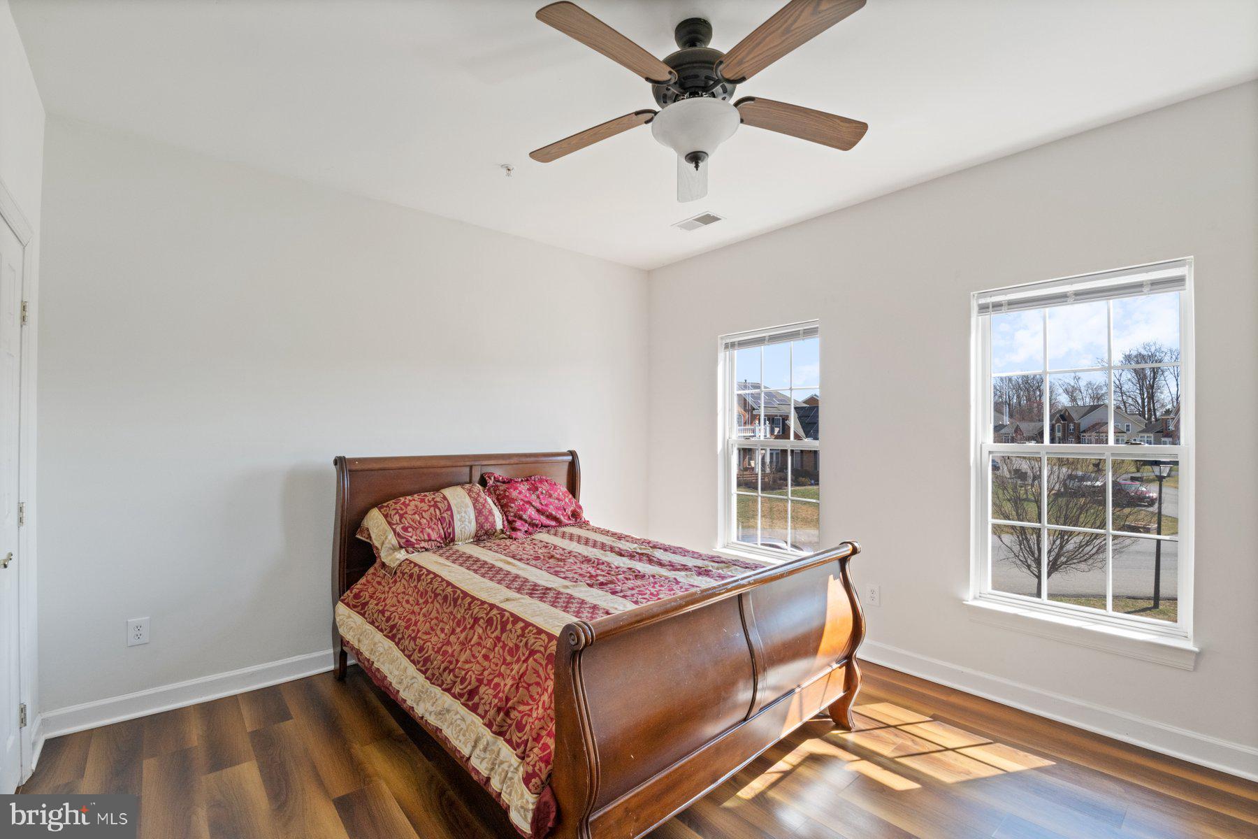 14206 Derby Ridge Road Bowie, MD 20721 - Photo 42 of 77 a bedroom with a bed and a window