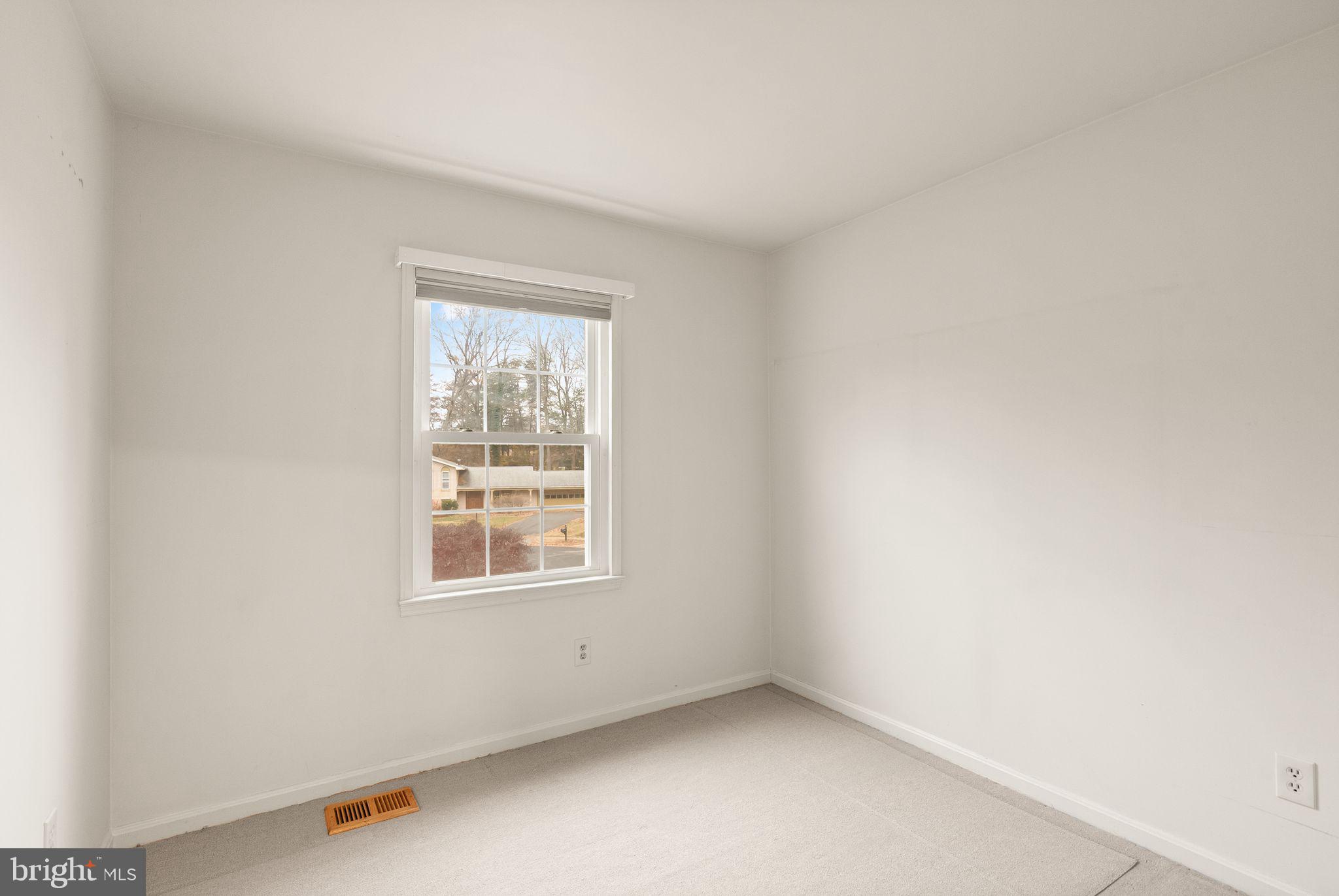 8522 Tysons Court Vienna, VA 22182 - Photo 14 of 27 an empty room with a window