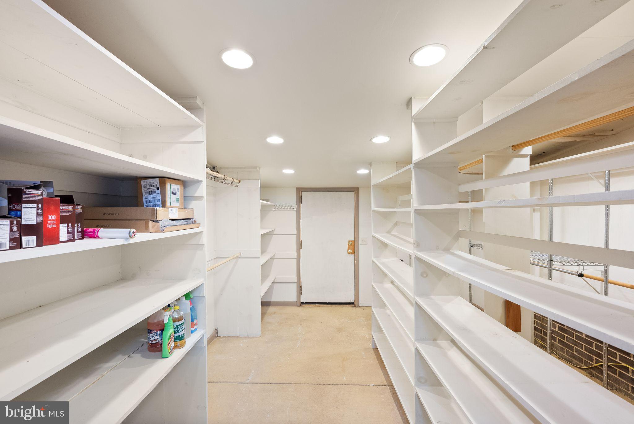 8522 Tysons Court Vienna, VA 22182 - Photo 17 of 27 a bathroom with a double vanity sink and a bathtub