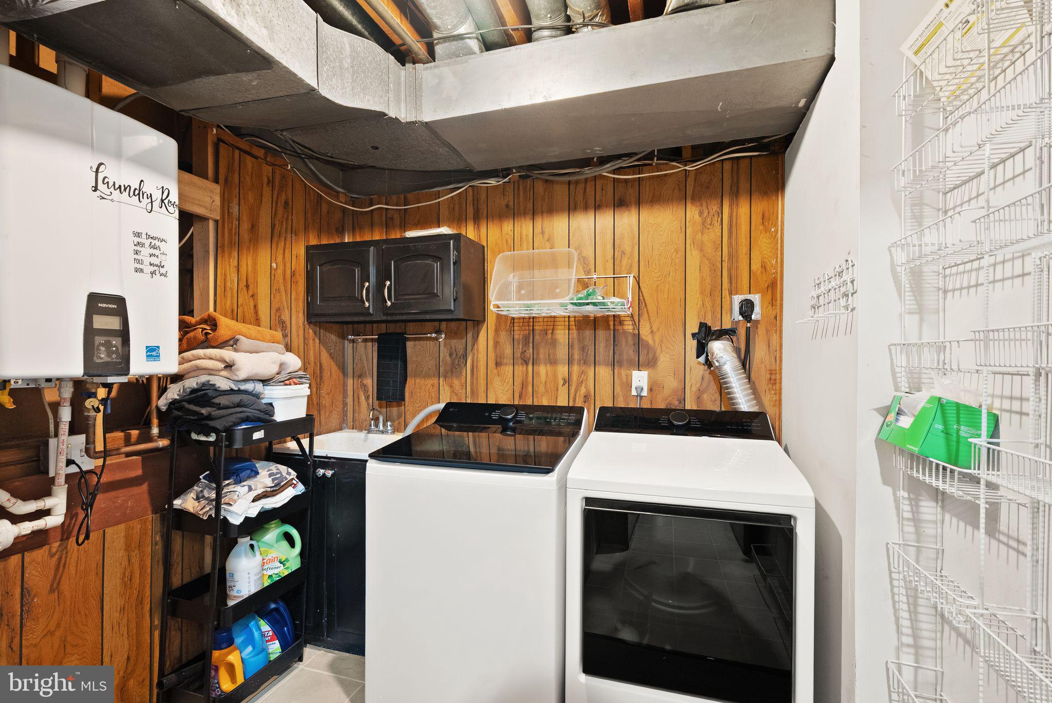 8522 Tysons Court Vienna, VA 22182 - Photo 18 of 27 a utility room with dryer and washer
