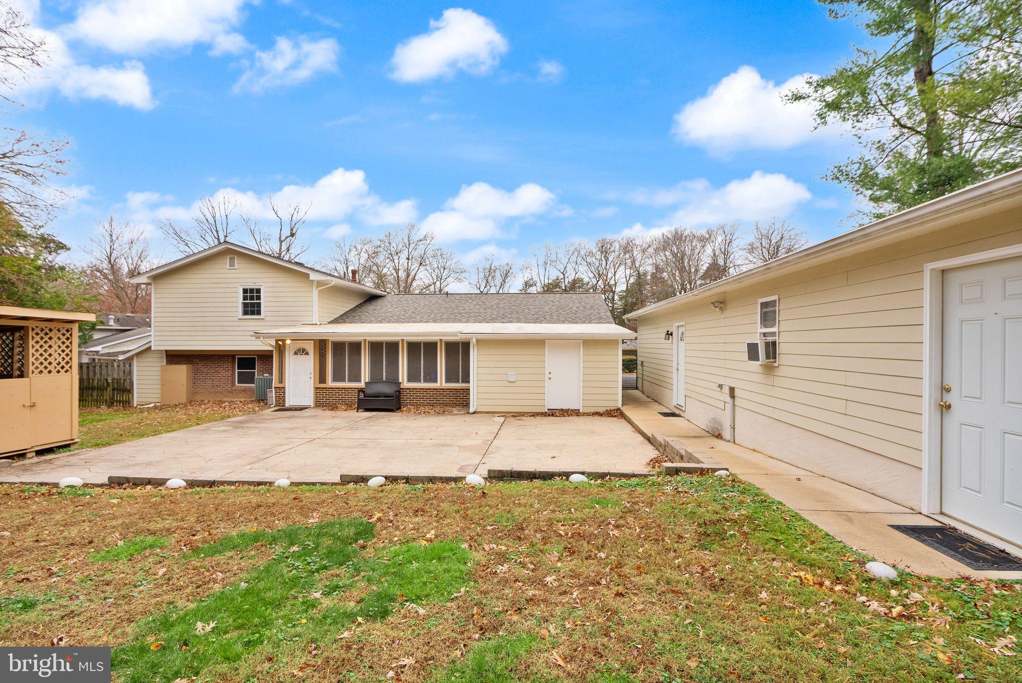 8522 Tysons Court Vienna, VA 22182 - Photo 23 of 27 a view of a house with a patio