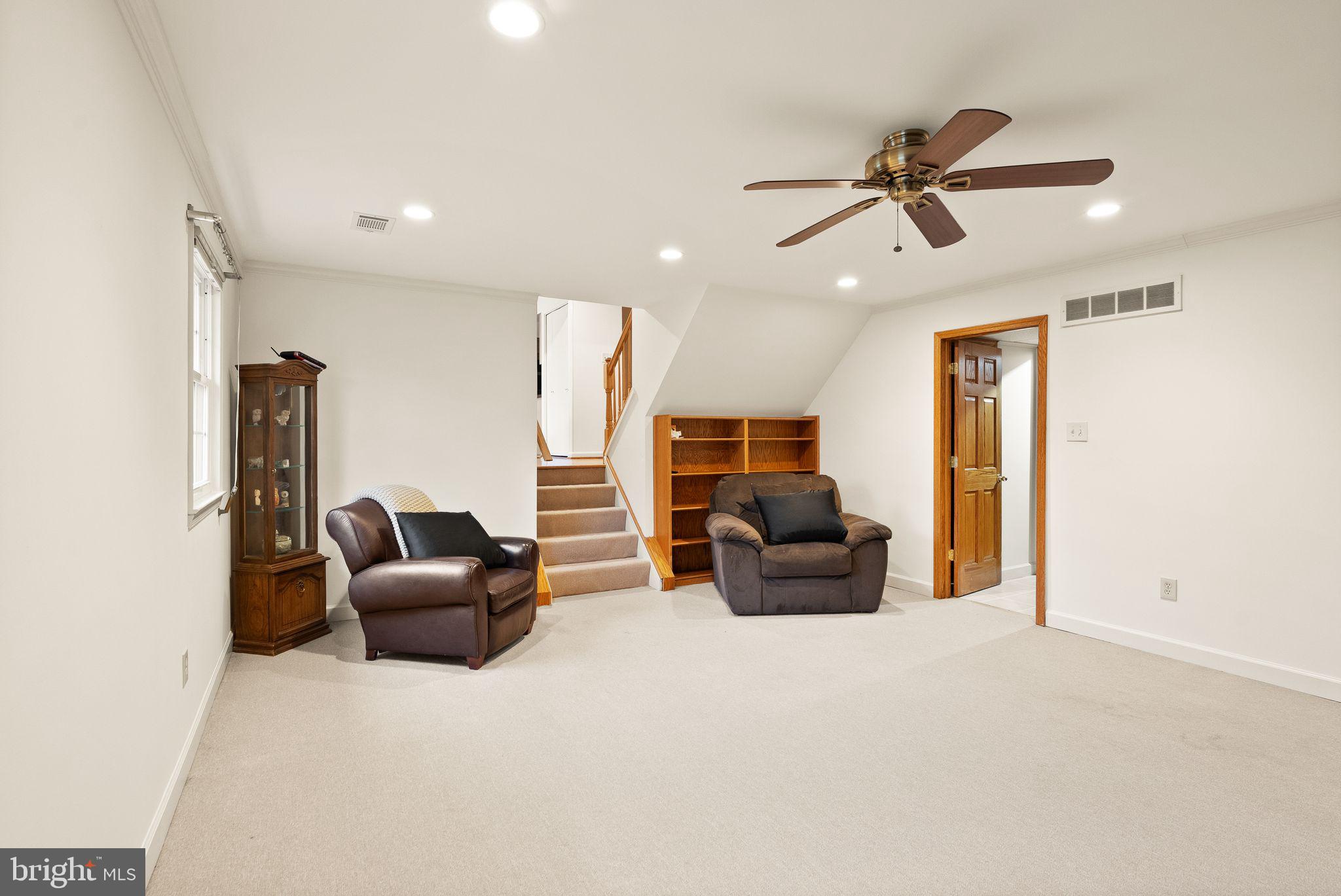 8522 Tysons Court Vienna, VA 22182 - Photo 10 of 27 a living room with furniture and a large window