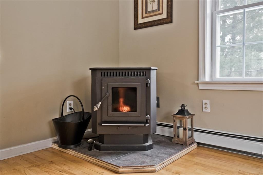 500 Sand Pond Road Limington, ME 04049 - Photo 20 of 34 The Pellet Stove Keeps Things Cozy Warm
