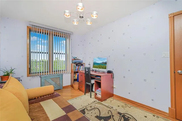 a workspace with furniture and window