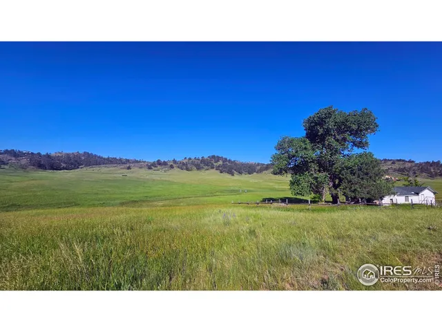 a view of an ocean and a mountain