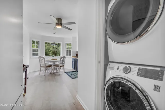 a view of a living room and dining room