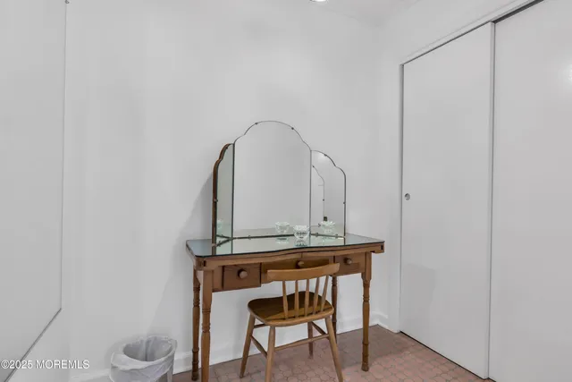 a room with a table and chairs