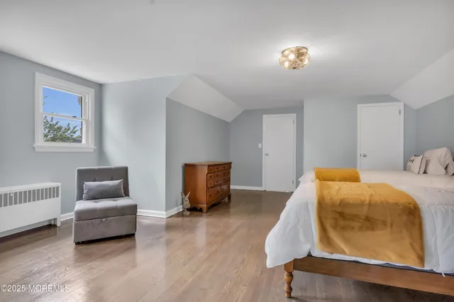 a bedroom with furniture and a couch