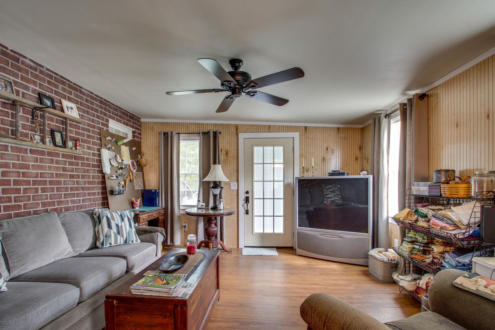 1587 Elnora Road White Bluff, TN 37187 - Photo 13 of 22 Exposed brick in Office / Den