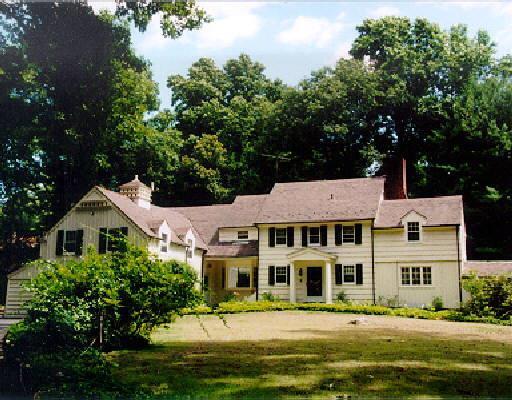 957 Sunset Road Stamford, CT 06903 - Photo 1 of 1 a front view of a building with a garden