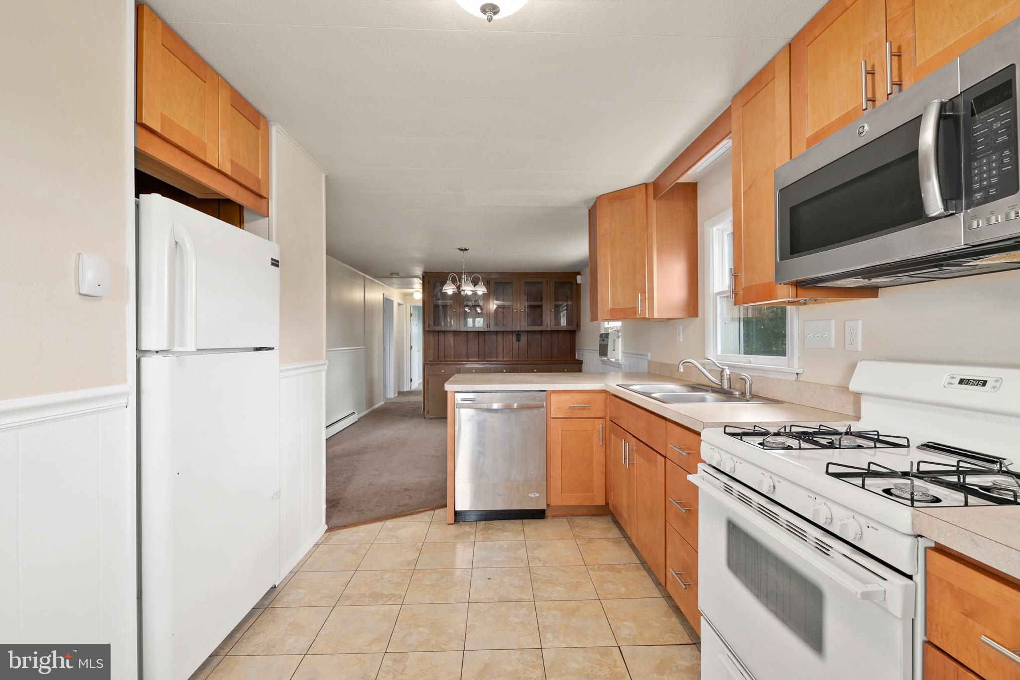 155 Old Crystal Beach Road Earleville, MD 21919 - Photo 7 of 20 Walking in the kitchen side door