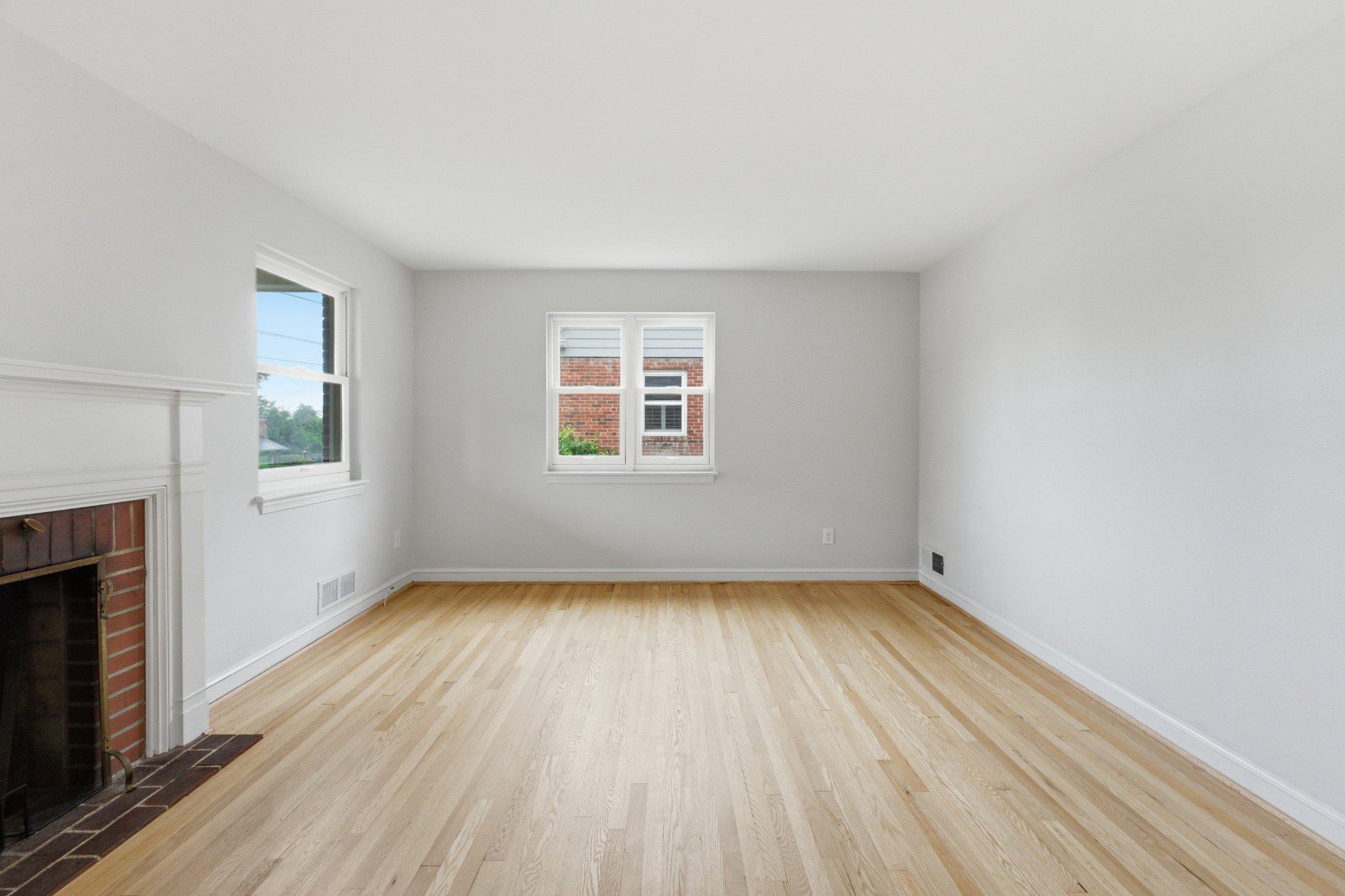 10143 Dallas Avenue Silver Spring, MD 20901 - Photo 10 of 49 Living Room w/ Wood-Burning Fireplace