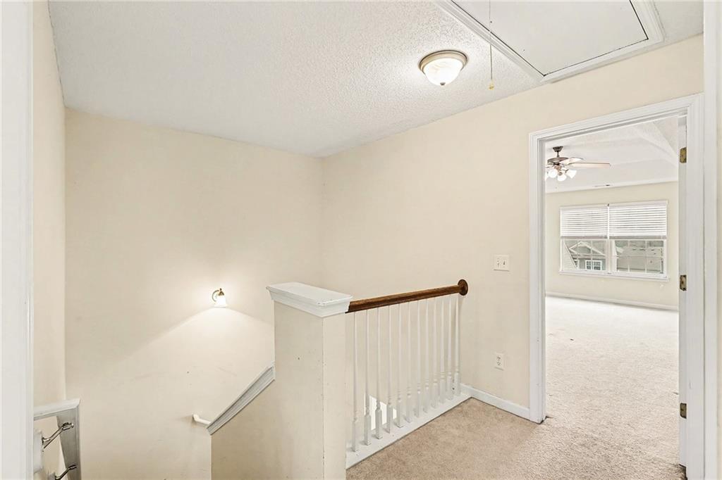 7676 Rutgers Circle Fairburn, GA 30213 - Photo 18 of 33 a view of a hallway