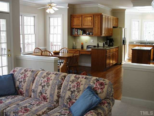 6212 Rein Street Raleigh, NC 27613 - Photo 4 of 12 Family room is open to the eat-in kitchen. Breakfast Area