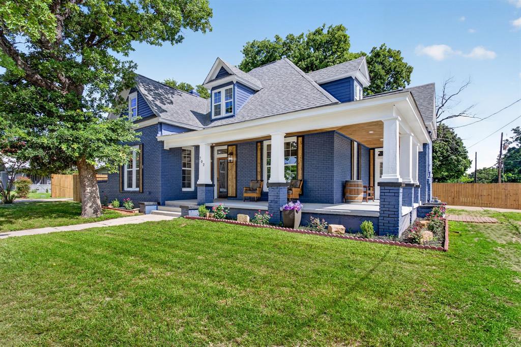 702 West Spring Street Weatherford, TX 76086 - Photo 1 of 39 Exterior featuring blue brick siding and white trim accents