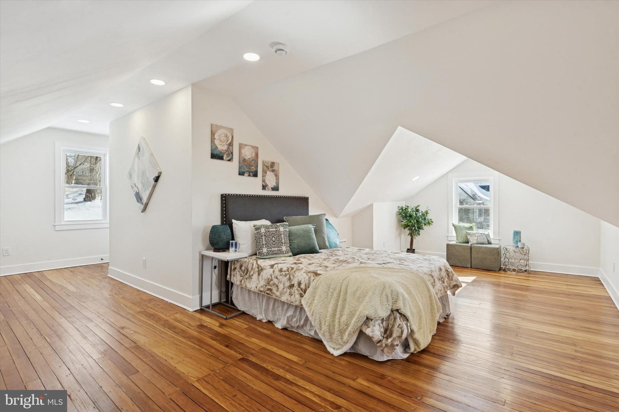 624 Convent Road Aston, PA 19014 - Photo 20 of 26 a bedroom with a bed and wooden floor