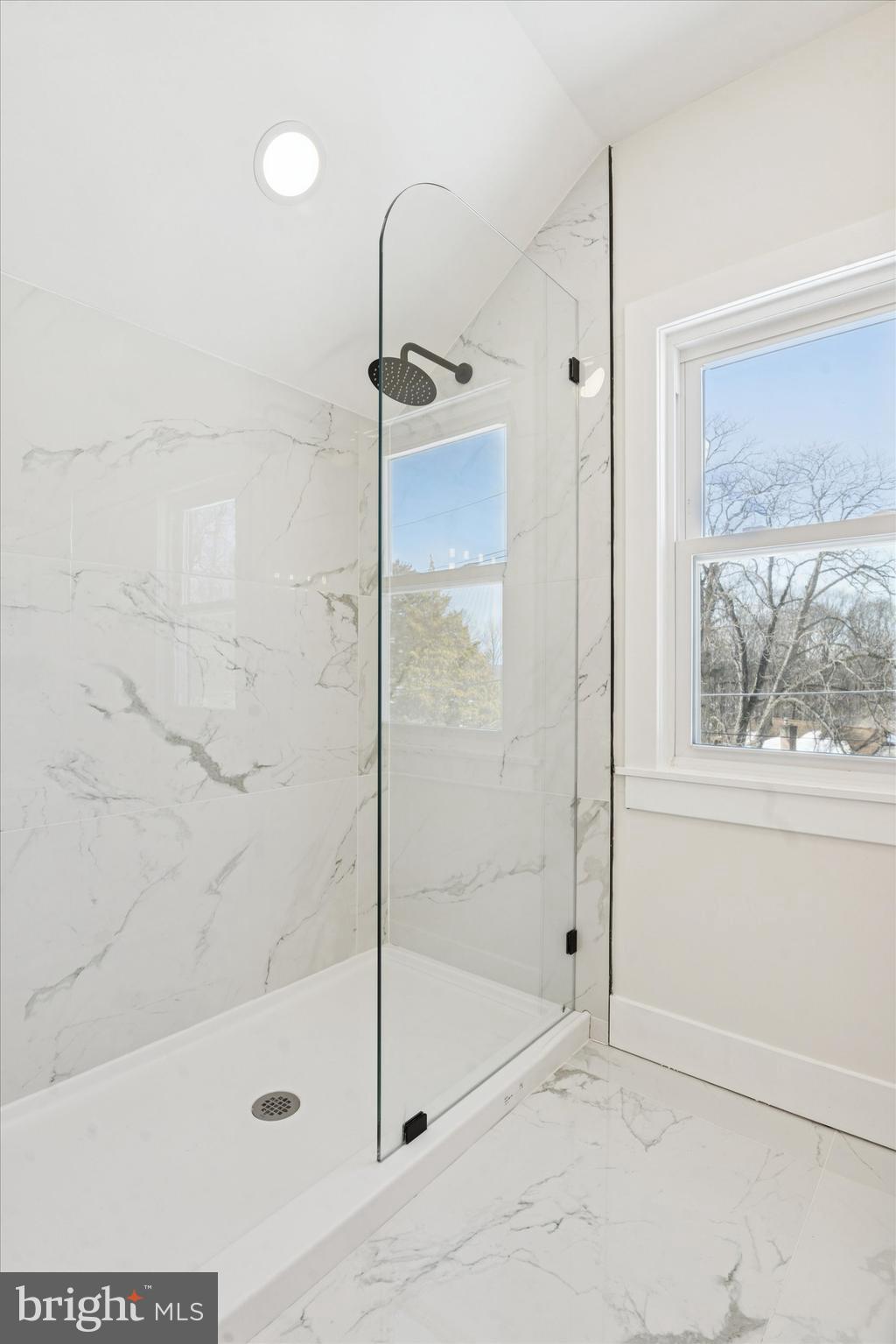 624 Convent Road Aston, PA 19014 - Photo 22 of 26 a bathroom with a bathtub and a shower