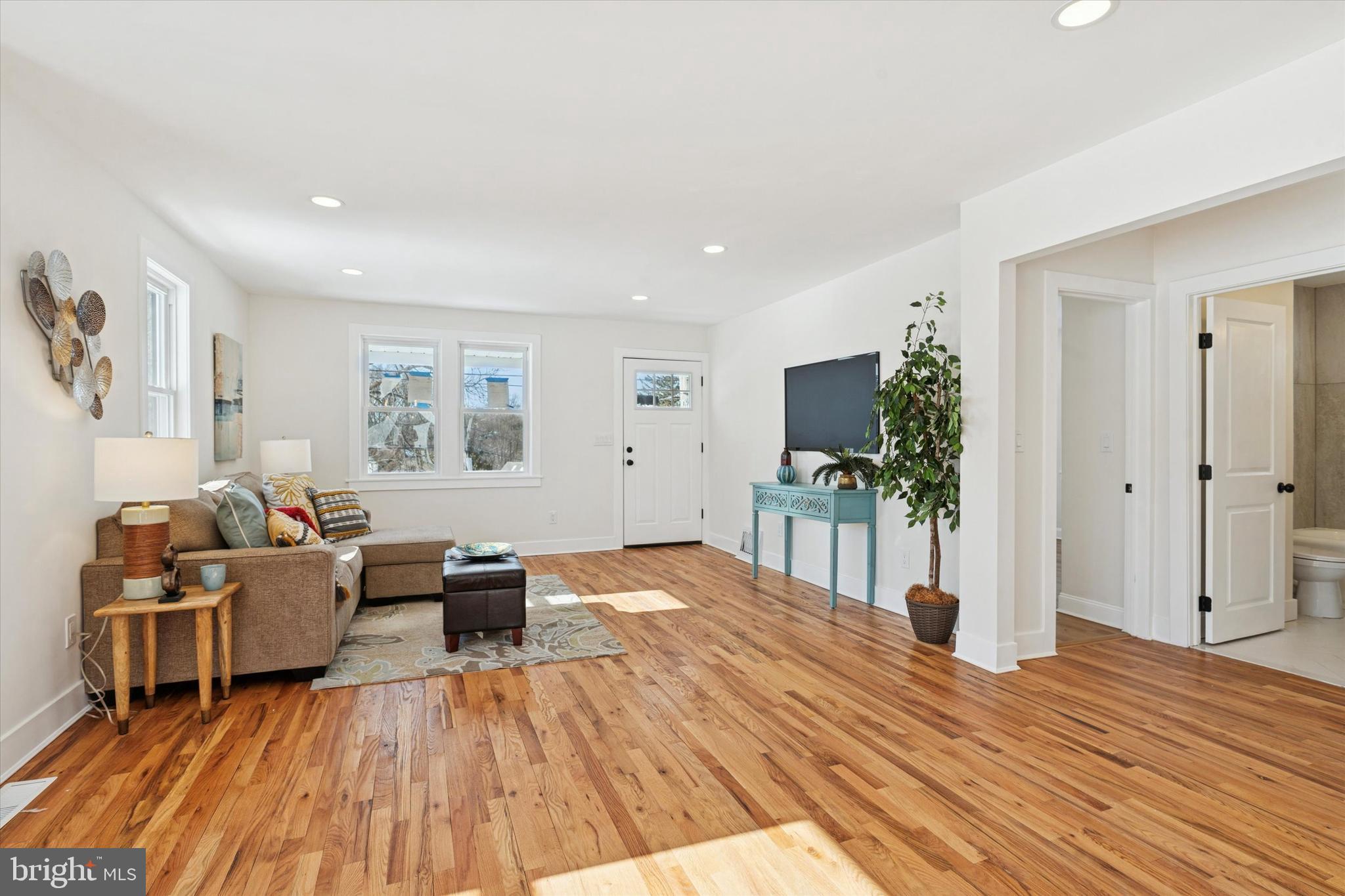 624 Convent Road Aston, PA 19014 - Photo 7 of 26 a living room with furniture and a wooden floor