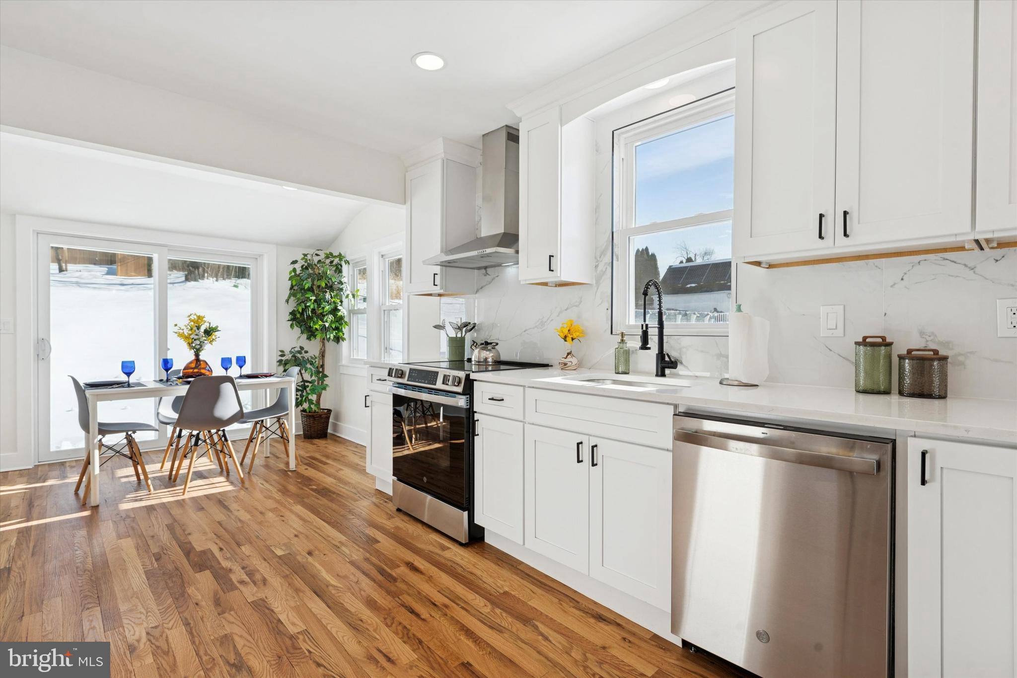624 Convent Road Aston, PA 19014 - Photo 9 of 26 a kitchen with white cabinets and appliances