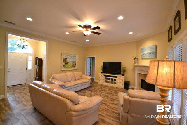 1640 Augusta Drive West Mobile, AL 36695 - Photo 2 of 25 Living Room with recessed lighting, gas log fireplace, and lots of natural light.