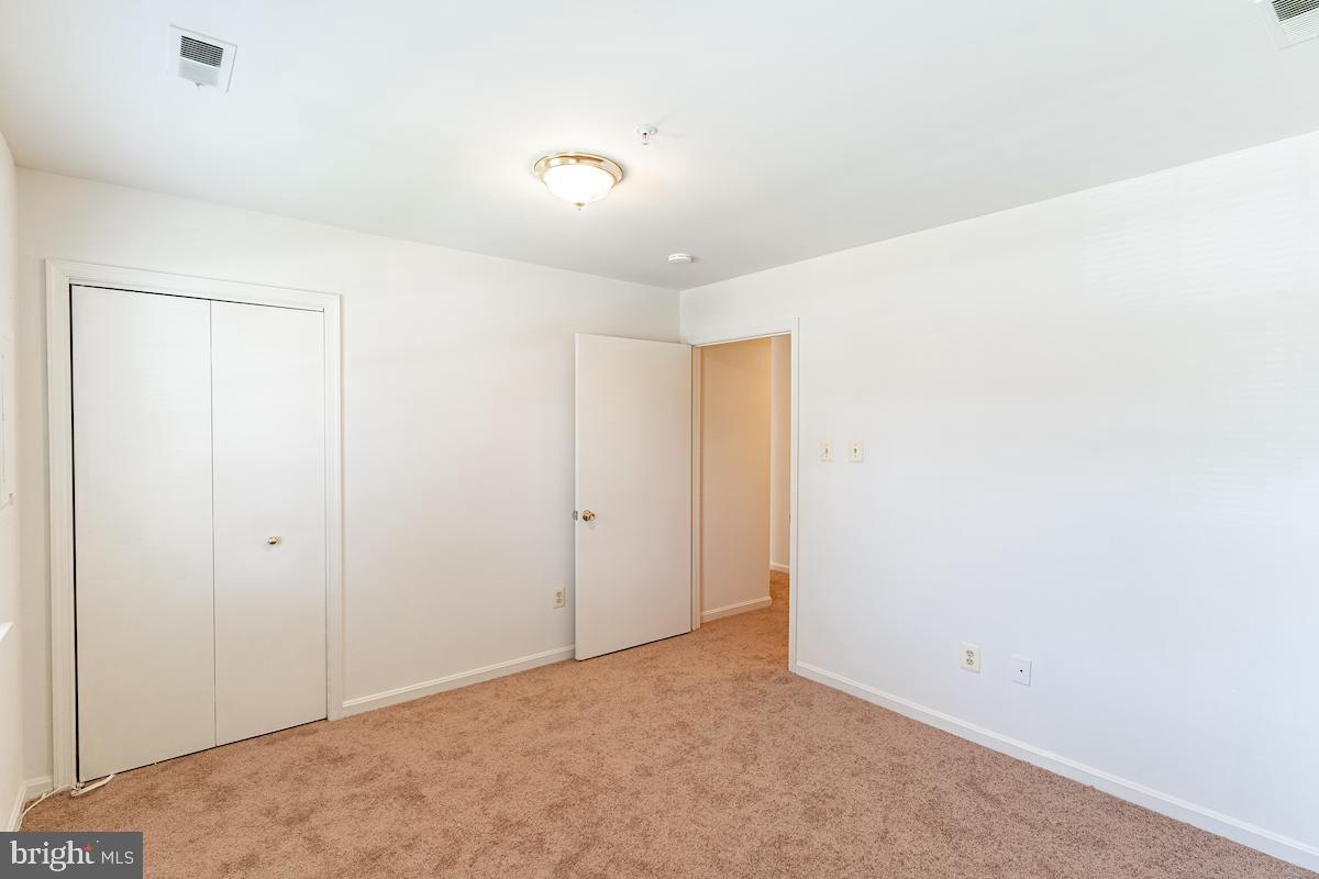 9268 Cherry Lane, Unit 57 Laurel, MD 20708 - Photo 19 of 33 Bedroom #2 closet space and lighting