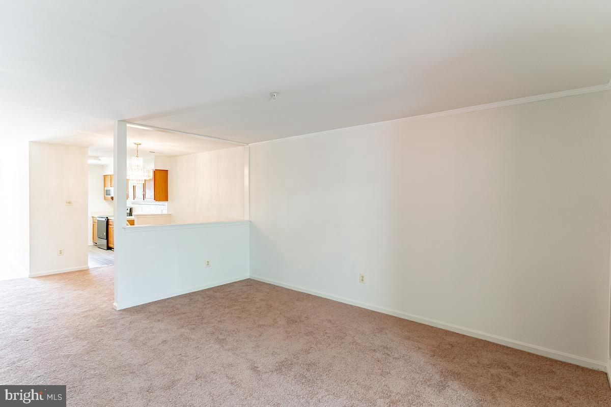 9268 Cherry Lane, Unit 57 Laurel, MD 20708 - Photo 28 of 33 Living room, dining area, kitchen