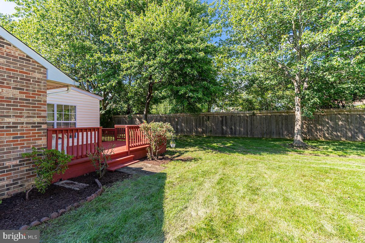 9268 Cherry Lane, Unit 57 Laurel, MD 20708 - Photo 29 of 33 Side deck and yard