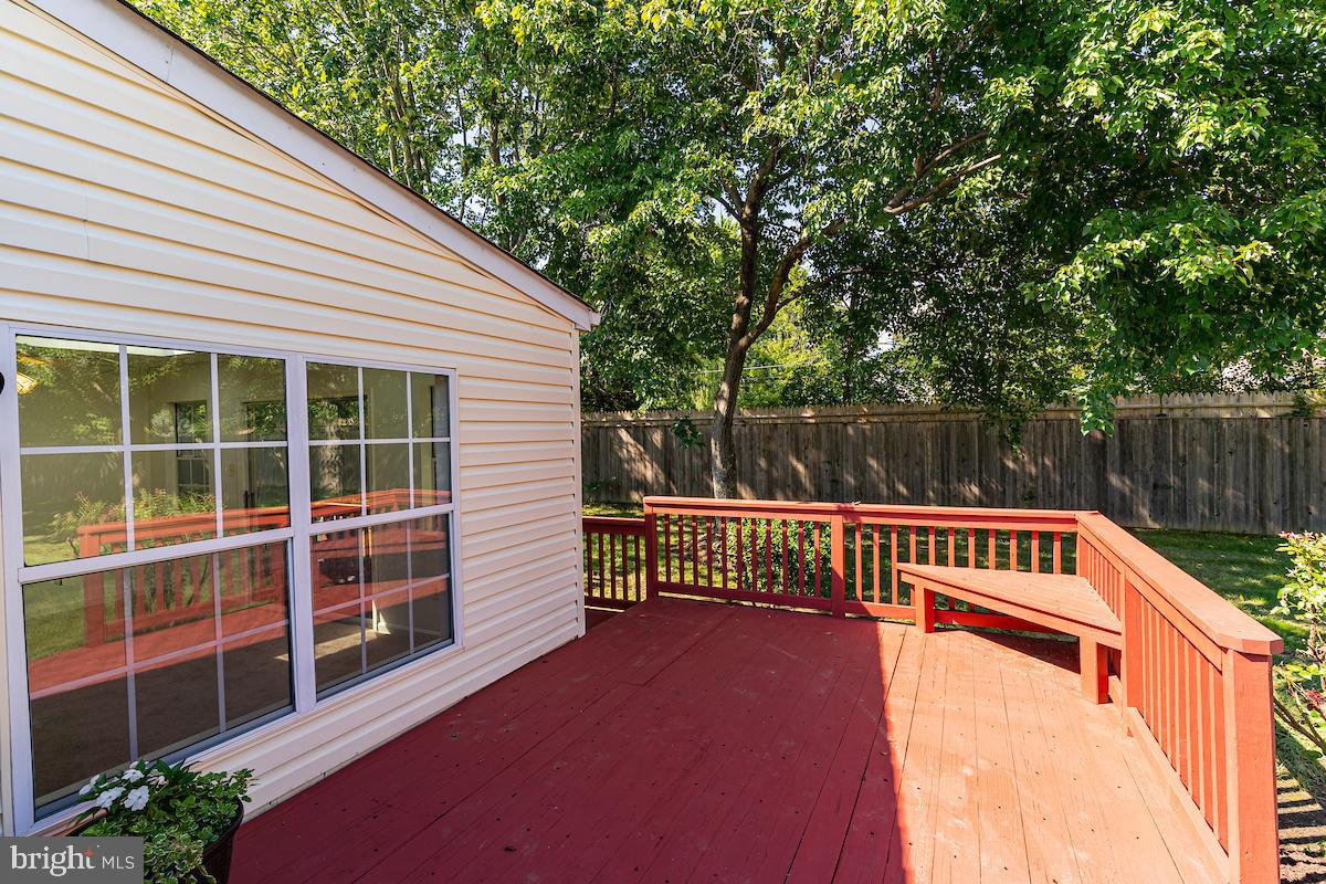 9268 Cherry Lane, Unit 57 Laurel, MD 20708 - Photo 30 of 33 Siding, large windows from Florida Room, deck