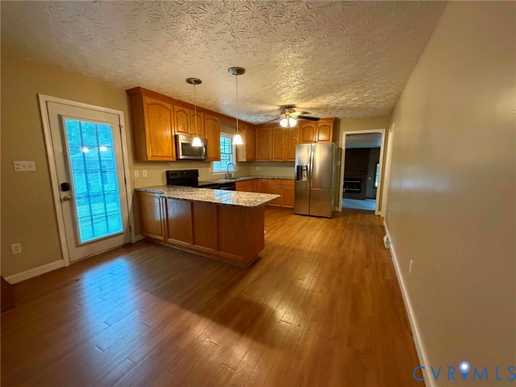 3766 Venter Road Aylett, VA 23009 - Photo 6 of 28 Kitchen featuring wood-finish flooring, light wood
