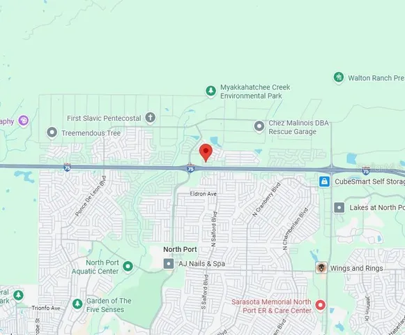 a picture of a book and a white bed