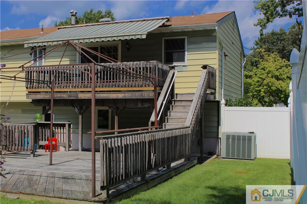 33 Andover Road Jackson, NJ 08527 - Photo 23 of 25 a front view of a house with backyard