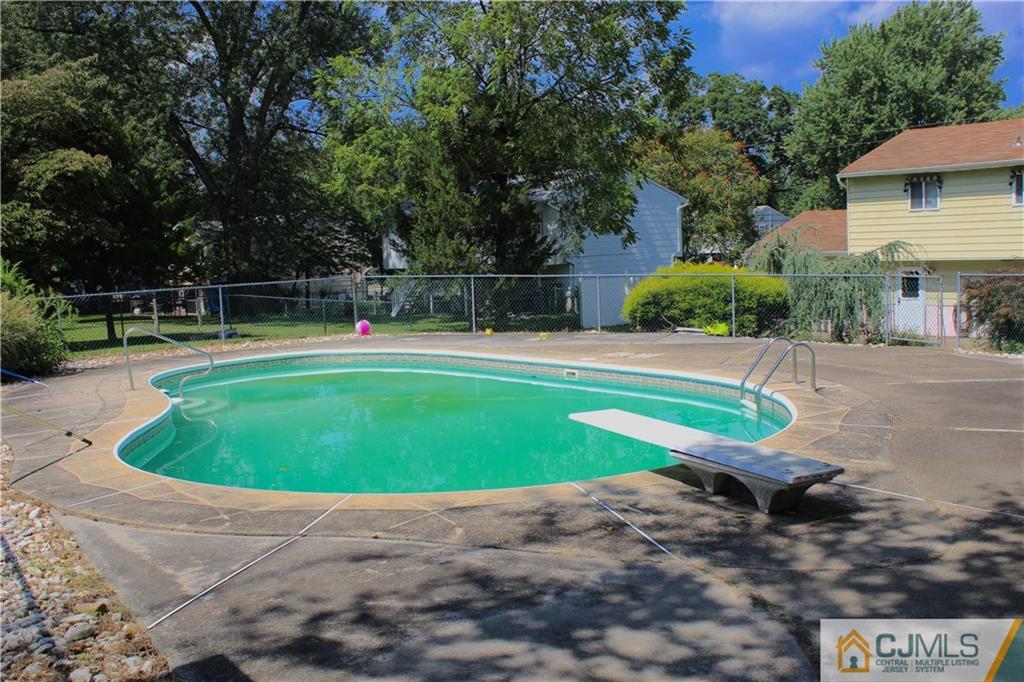 33 Andover Road Jackson, NJ 08527 - Photo 25 of 25 a view of a backyard with swimming pool