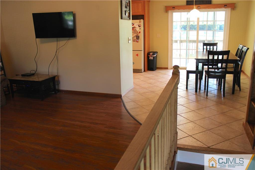33 Andover Road Jackson, NJ 08527 - Photo 5 of 25 a view of a dining room with furniture and a window