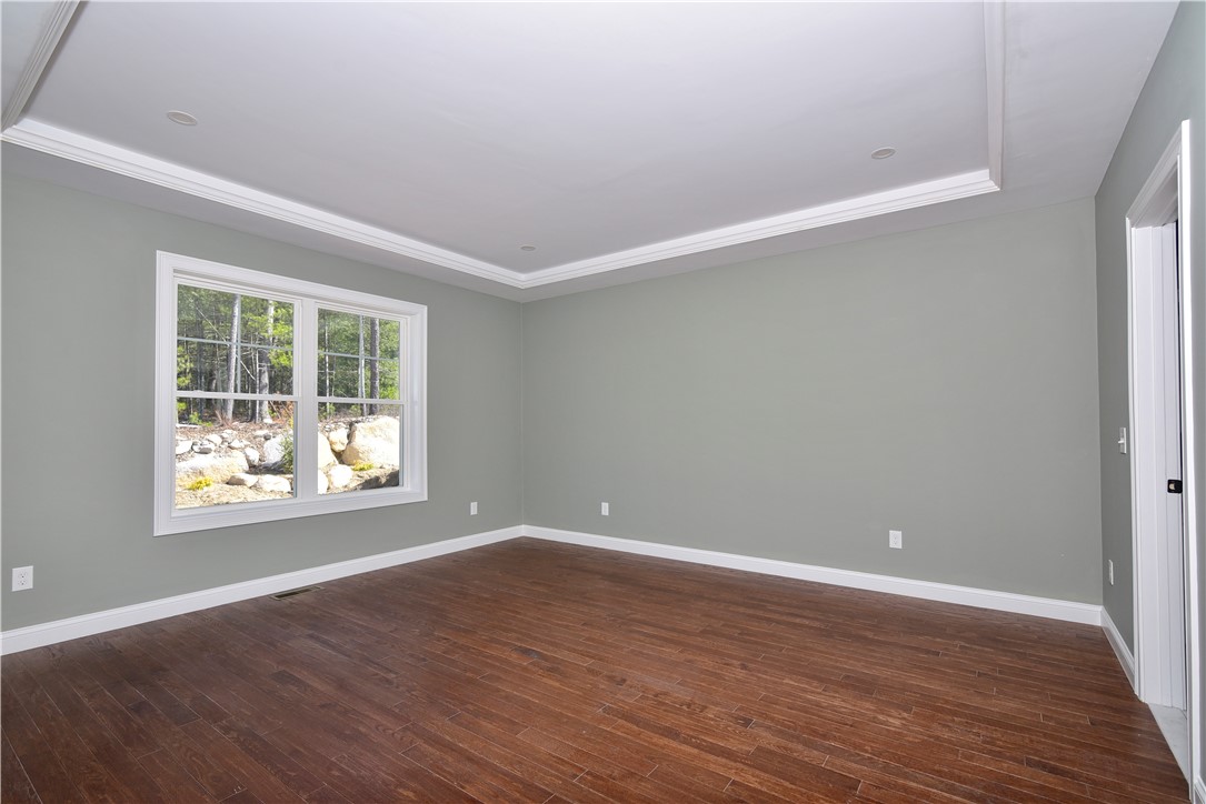 27 Sunset Lk Circle Coventry, RI 02816 - Photo 17 of 31 with lighted tray ceiling and walk in closet