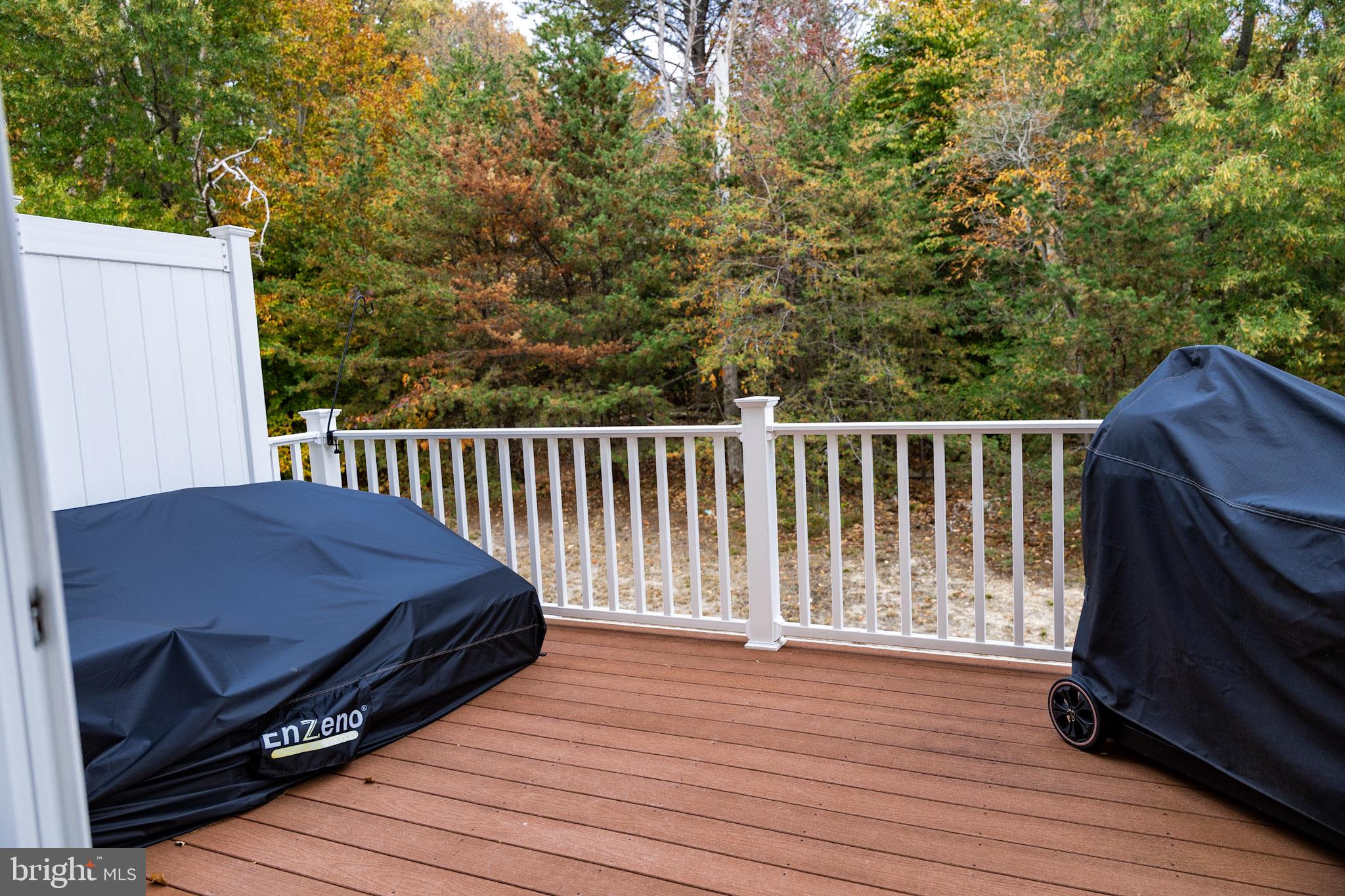 8453 Winding Trail Laurel, MD 20724 - Photo 18 of 24 a balcony with wooden floor and fence