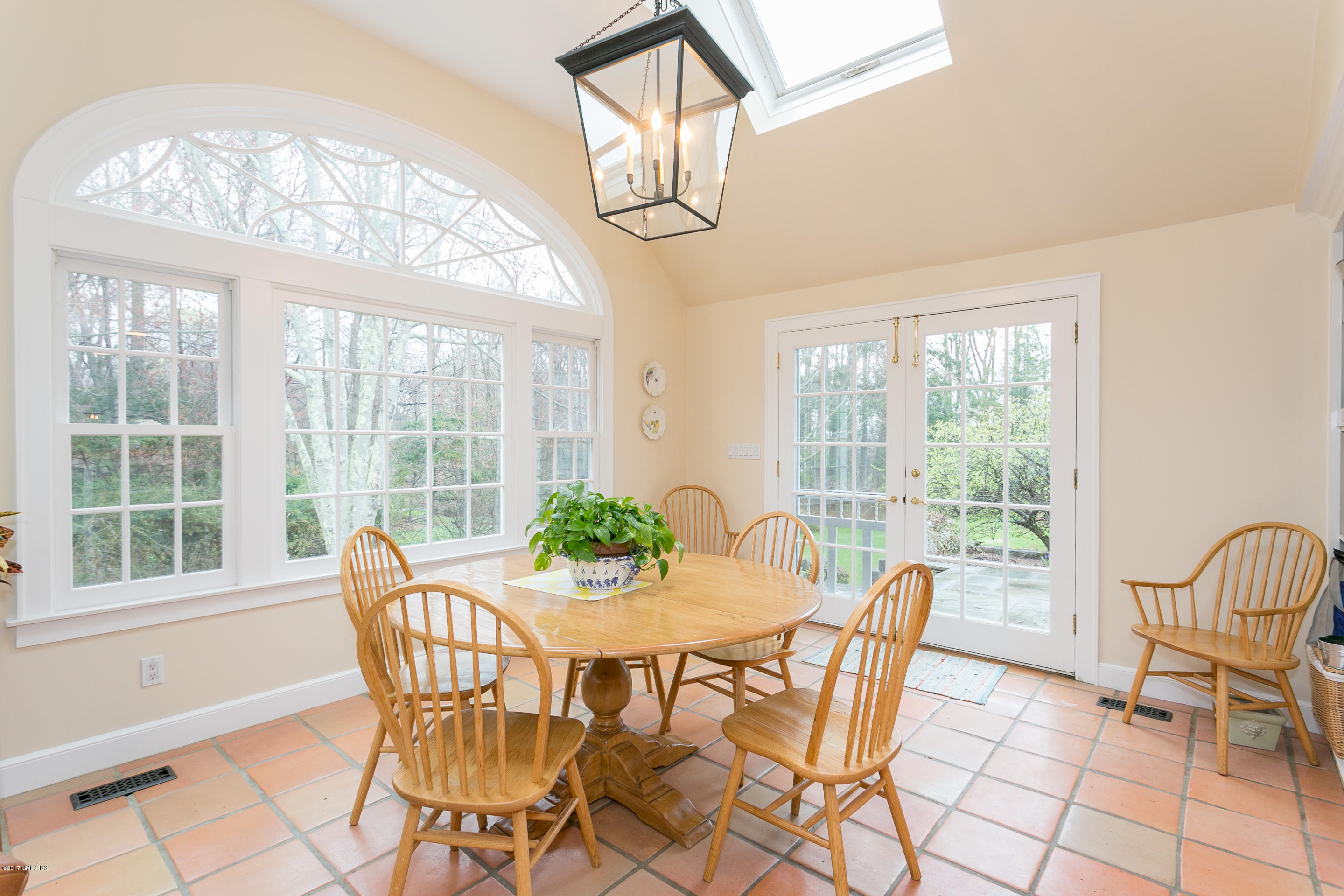 20 Dewart Road Greenwich, CT 06830 - Photo 11 of 22 a view of a dining room with furniture window and outside view