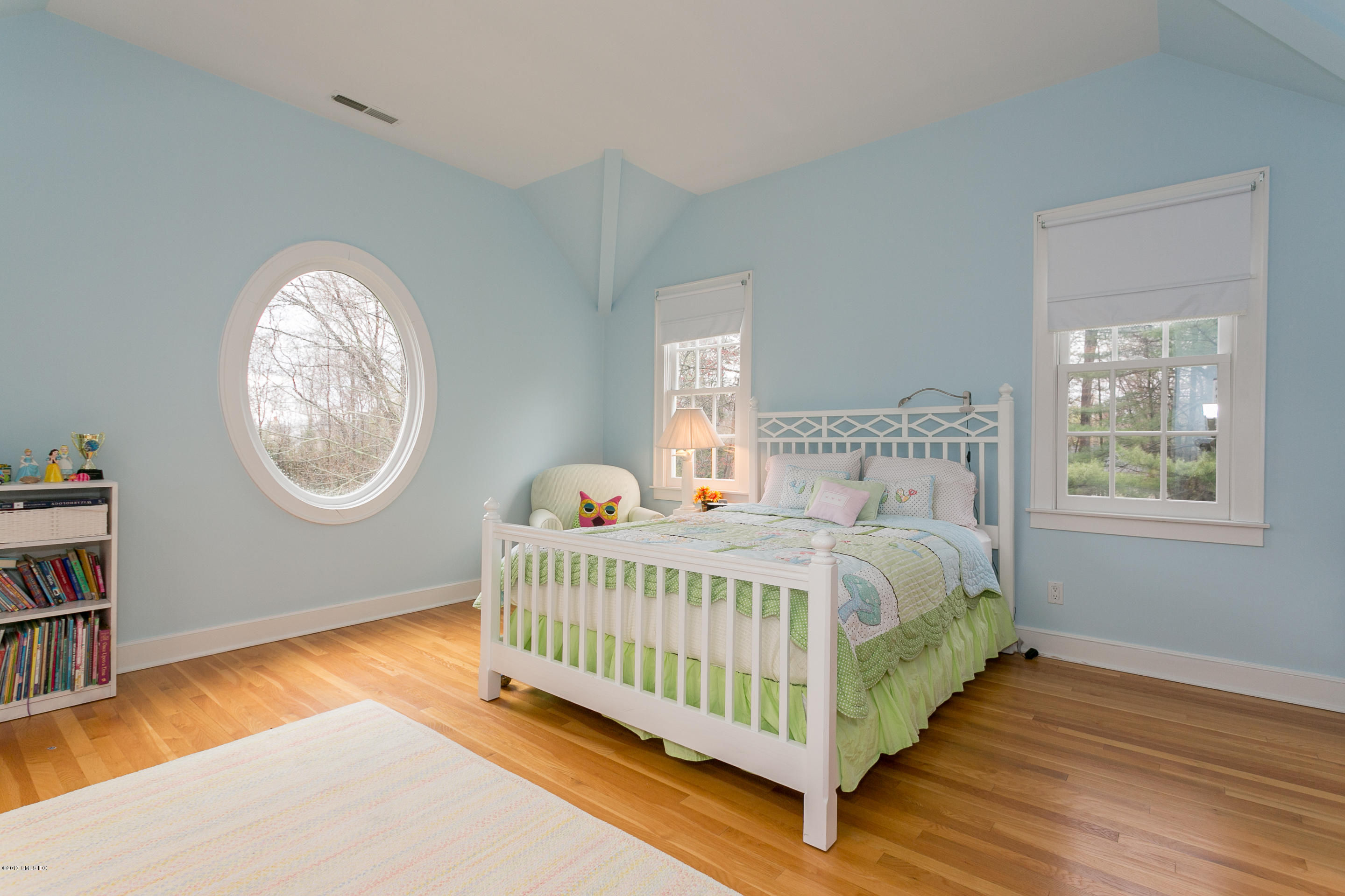 20 Dewart Road Greenwich, CT 06830 - Photo 18 of 22 a bedroom with a bed and a window
