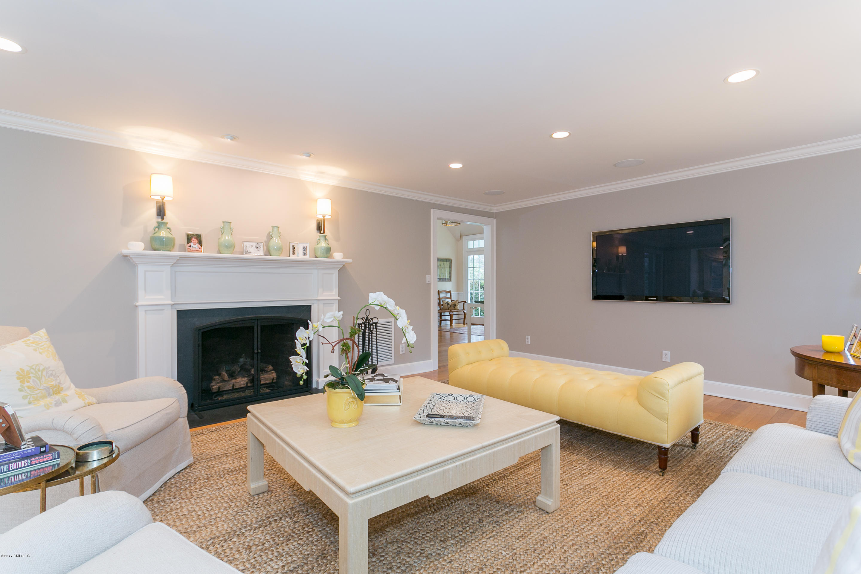 20 Dewart Road Greenwich, CT 06830 - Photo 6 of 22 a living room with furniture and a fireplace