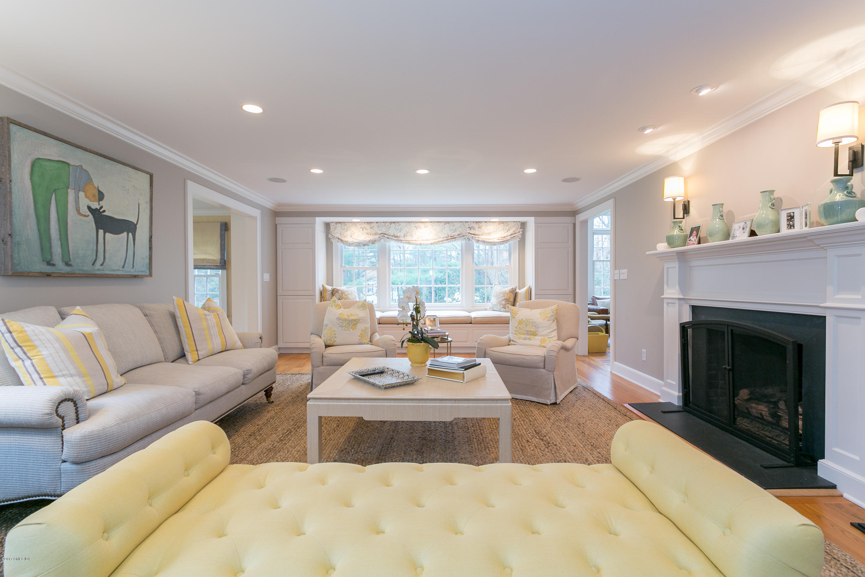 20 Dewart Road Greenwich, CT 06830 - Photo 7 of 22 a living room with furniture and a fireplace