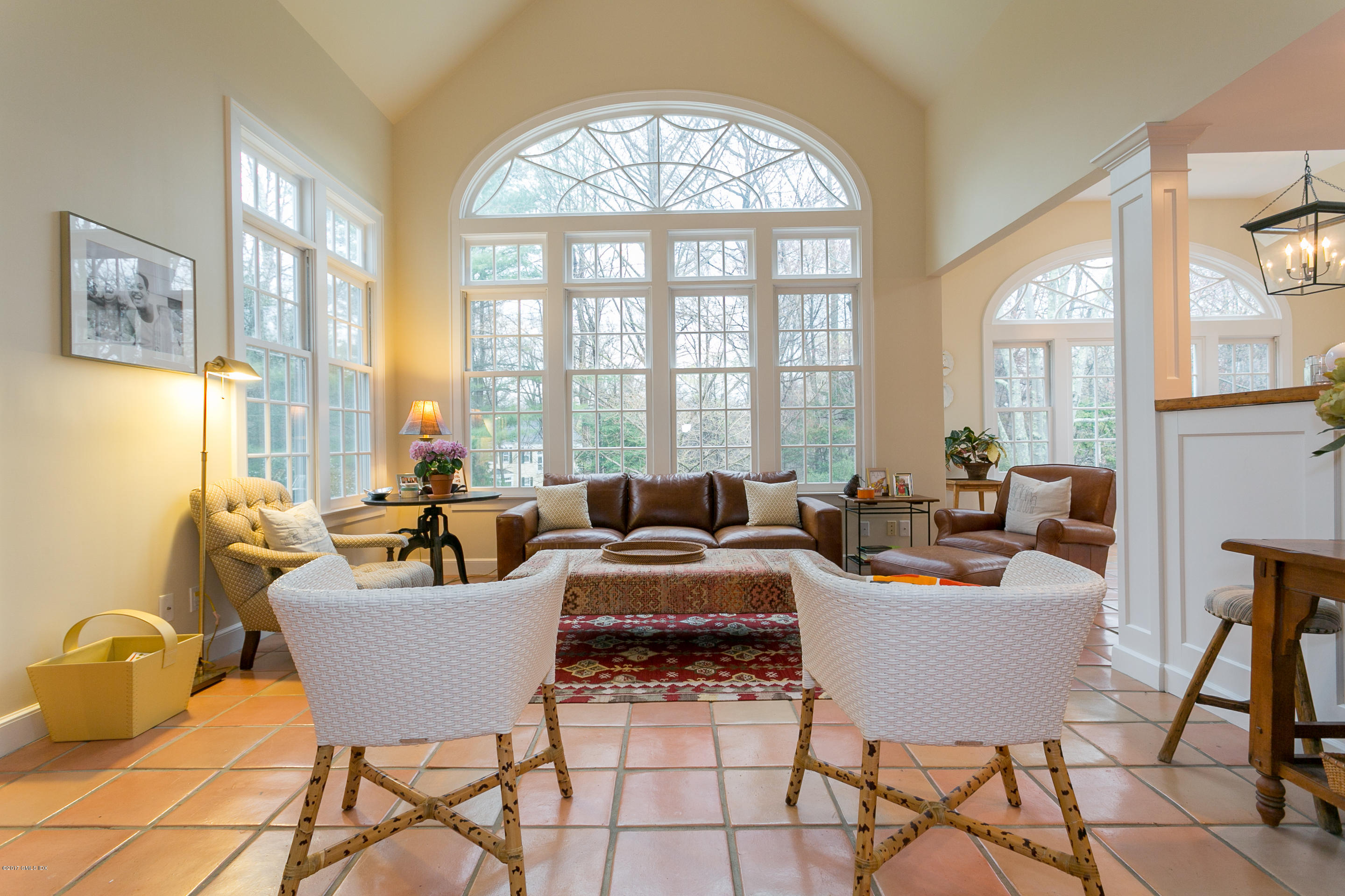 20 Dewart Road Greenwich, CT 06830 - Photo 9 of 22 a living room with patio furniture and a large window