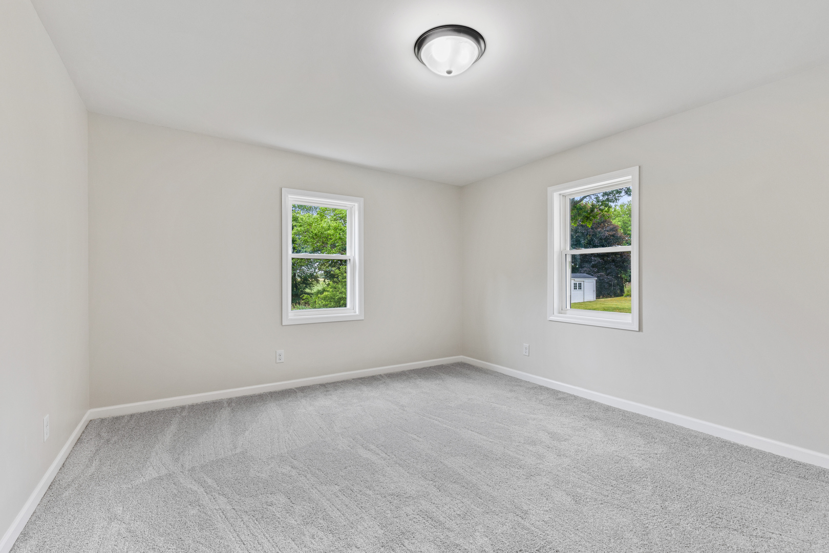 1413 Brookside Drive Rochelle, IL 61068 - Photo 13 of 29 an empty room with windows