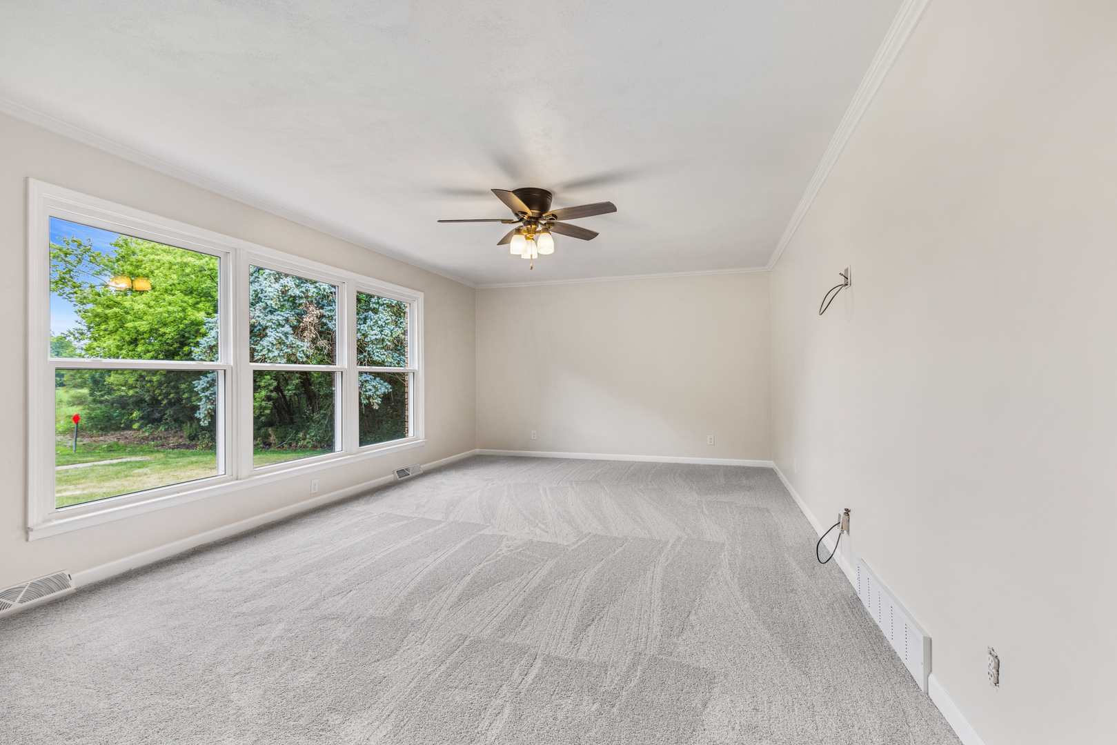1413 Brookside Drive Rochelle, IL 61068 - Photo 5 of 29 a view of an empty room with a window