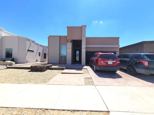 a view of a car parked in front of a building