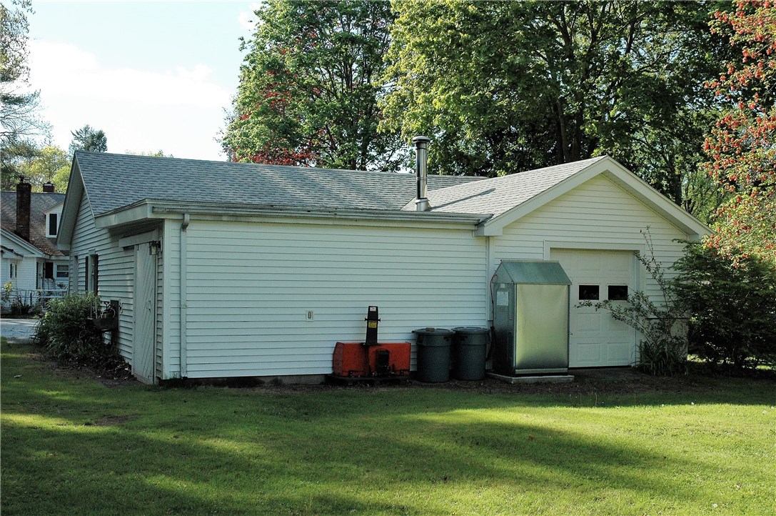 401 New Meadow Road Barrington, RI 02806 - Photo 5 of 11 Rear of garage with 3rd bay and workshop space