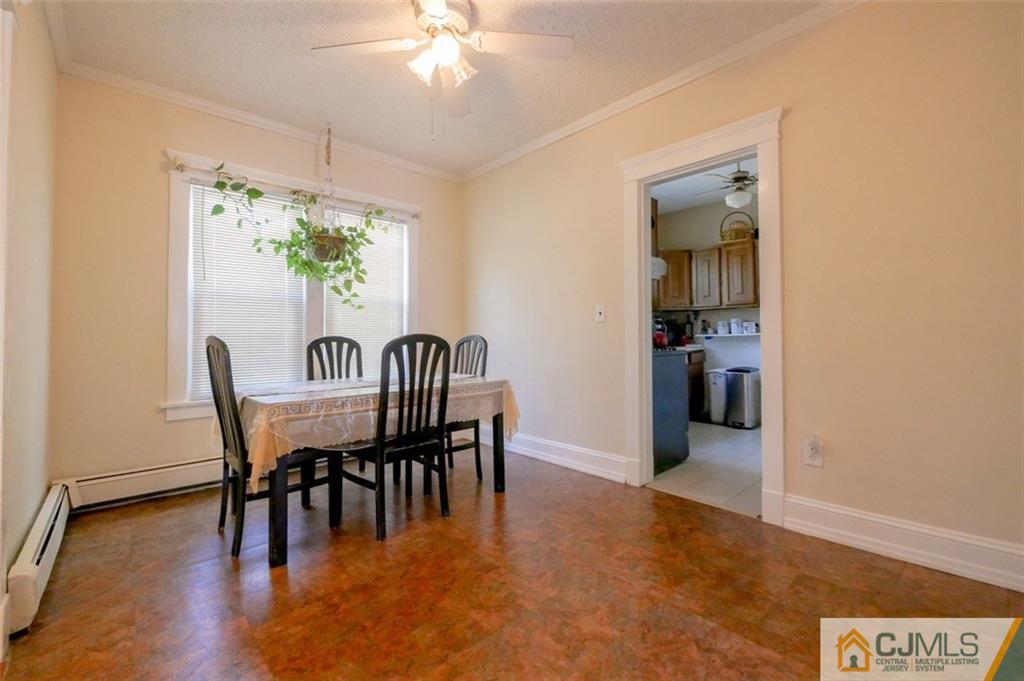 65 Meadow Road Edison, NJ 08817 - Photo 11 of 24 a dining room with furniture and window